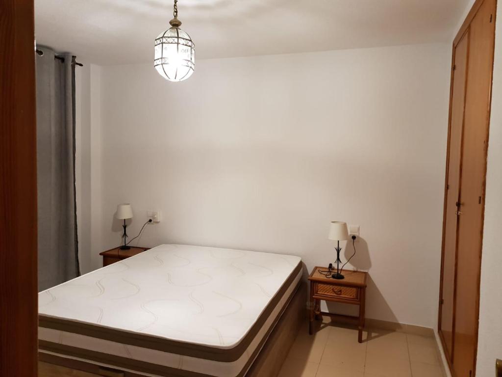 Postel nebo postele na pokoji v ubytování Almerimar Apartamento