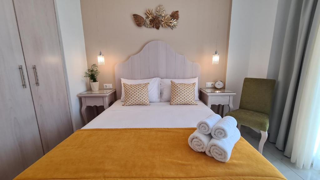 Postel nebo postele na pokoji v ubytování Elite Residence