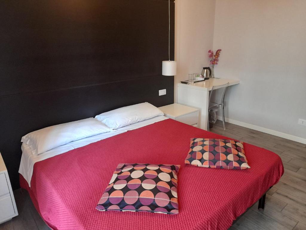 Posteľ alebo postele v izbe v ubytovaní Guest House Piazza Bologna