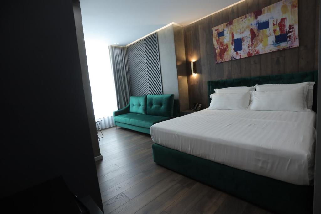Postel nebo postele na pokoji v ubytování AP Hotel Boutique