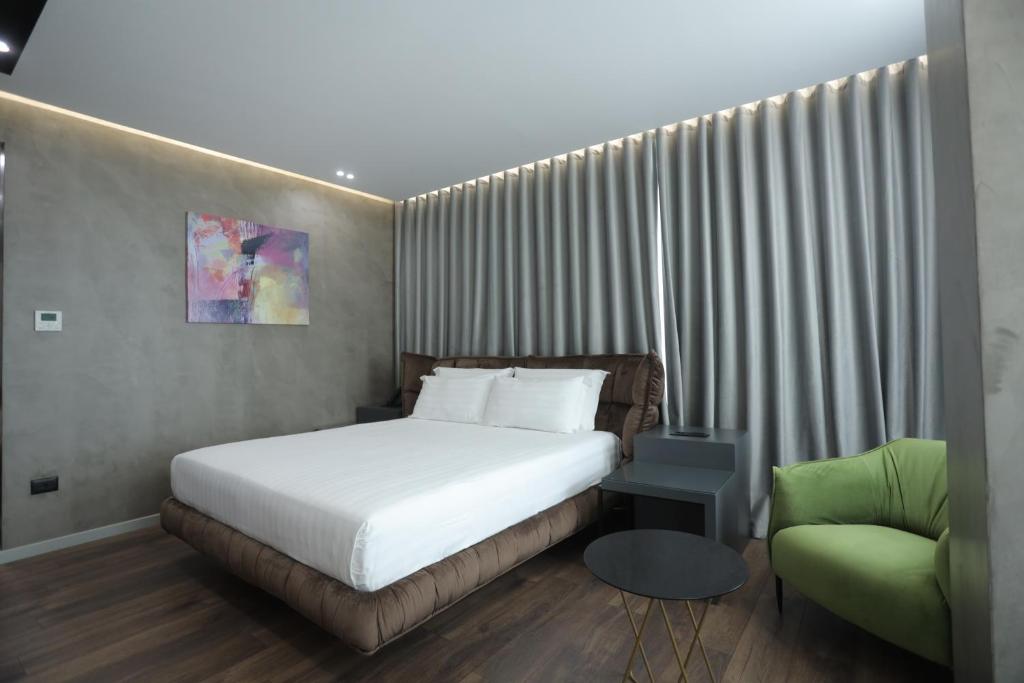 Postel nebo postele na pokoji v ubytování AP Hotel Boutique