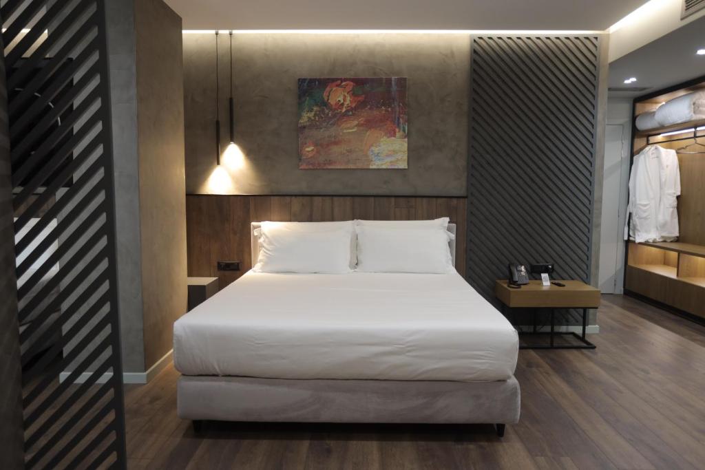 Postel nebo postele na pokoji v ubytování AP Hotel Boutique