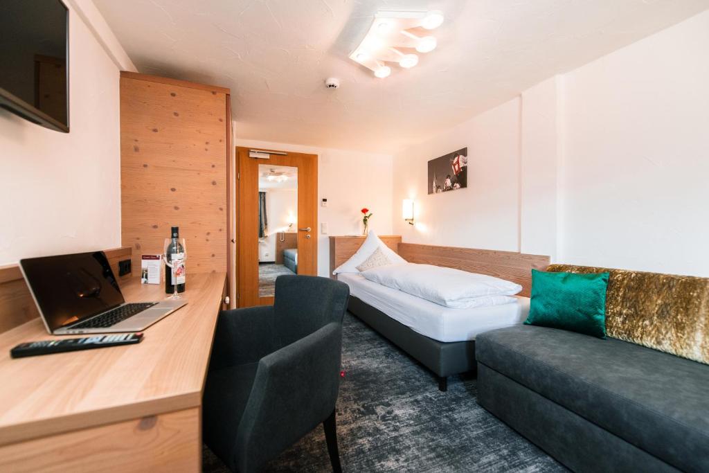 TV a/nebo společenská místnost v ubytování Hotel Tradizio