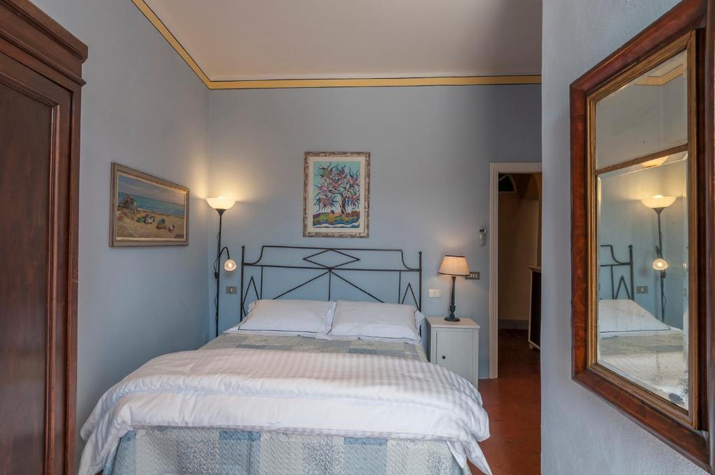 Posteľ alebo postele v izbe v ubytovaní B&B Arena di Lucca