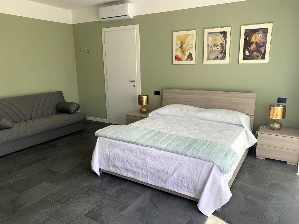 Postel nebo postele na pokoji v ubytování Casa Verde, Dongo, Lago di Como