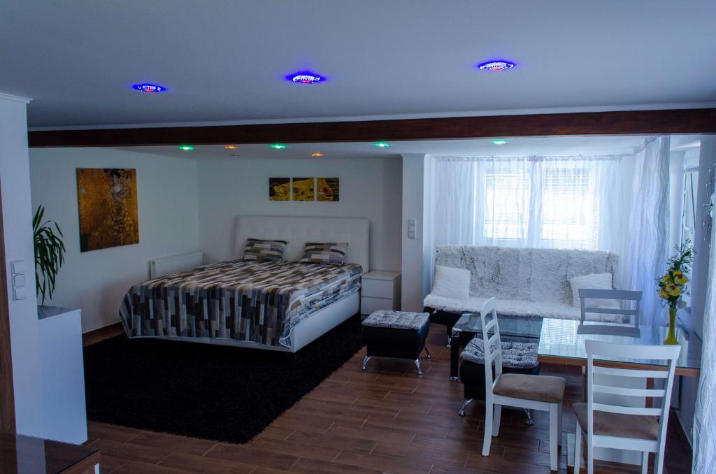 Postel nebo postele na pokoji v ubytování Apartmány LIZARD