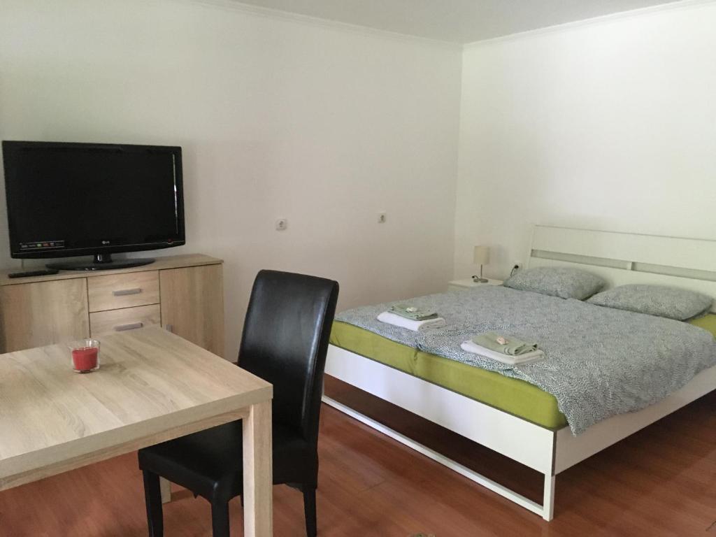 Postel nebo postele na pokoji v ubytování Bakonyi Kemencésház