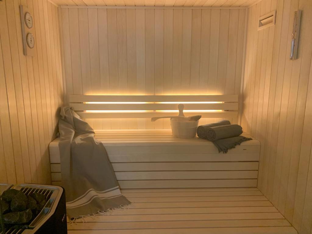 a small sauna with a sink in a room at Manoir de Malagorse in Cuzance