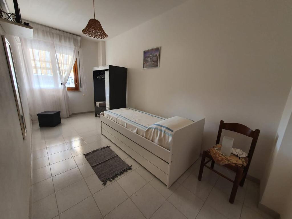 Łóżko lub łóżka w pokoju w obiekcie Casa Ameria
