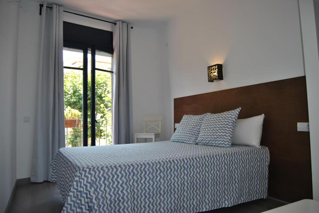 Cama o camas de una habitación en L'Hostalet de Canet