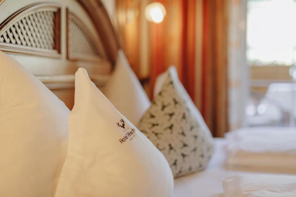 Postel nebo postele na pokoji v ubytování Hotel Hirschen