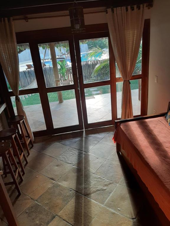 Postel nebo postele na pokoji v ubytování Casas Capulana