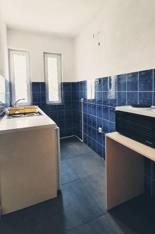 Koupelna v ubytování Apartmani Kaldrma
