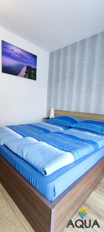 Posteľ alebo postele v izbe v ubytovaní Willa Aqua