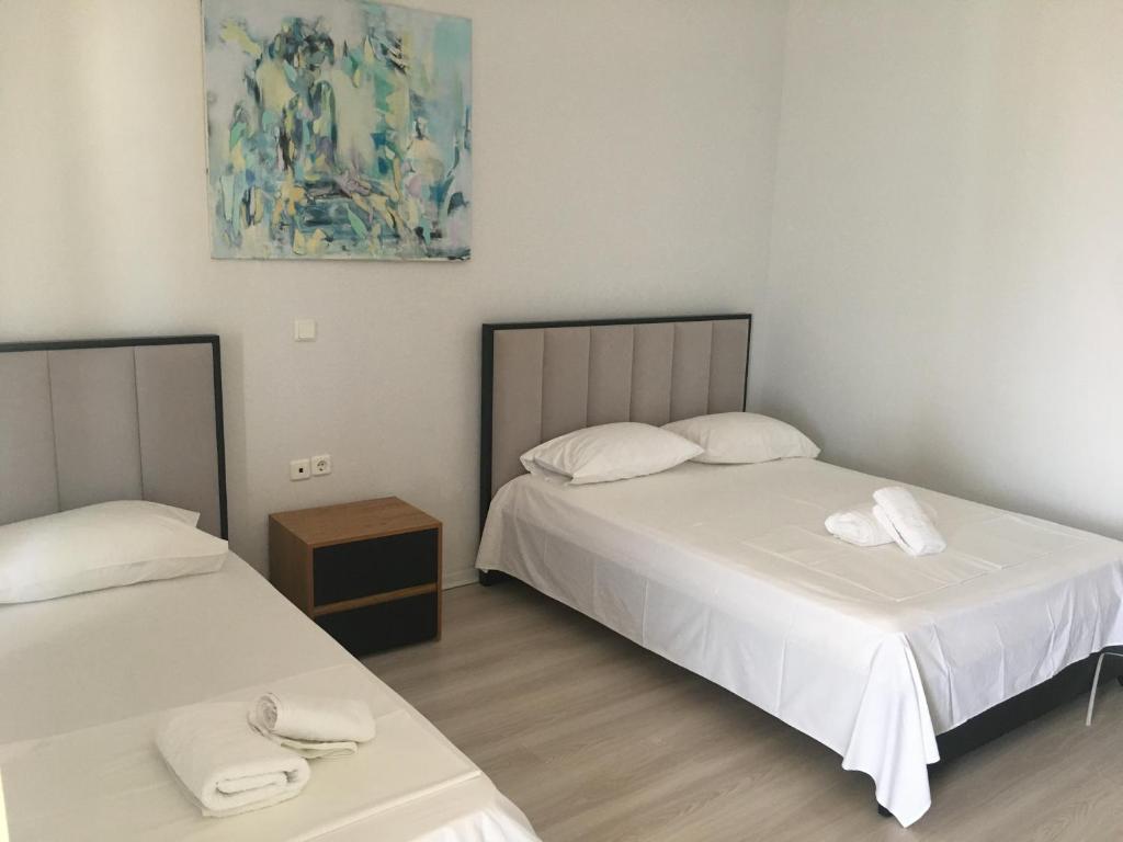 Postel nebo postele na pokoji v ubytování IRINI boutique rooms!!!