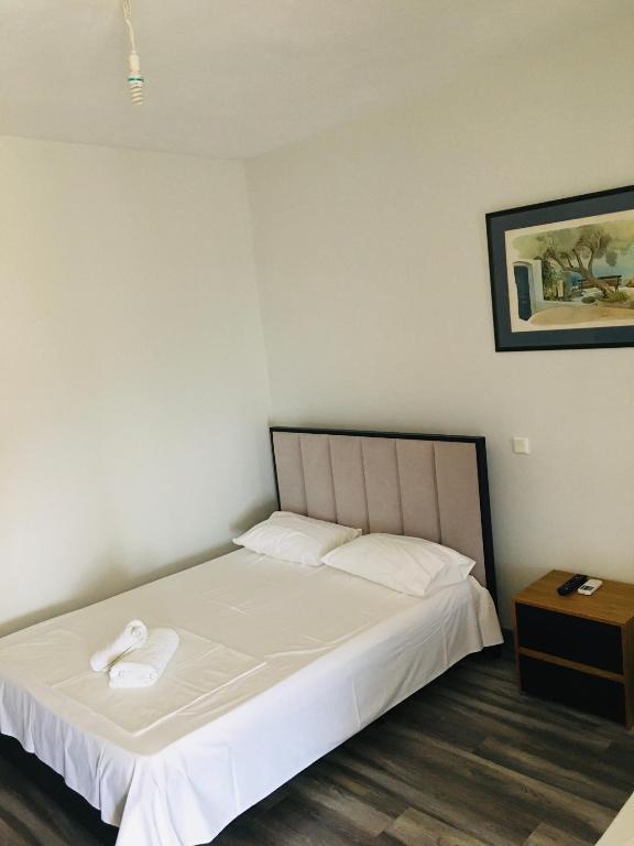 Postel nebo postele na pokoji v ubytování IRINI boutique rooms!!!