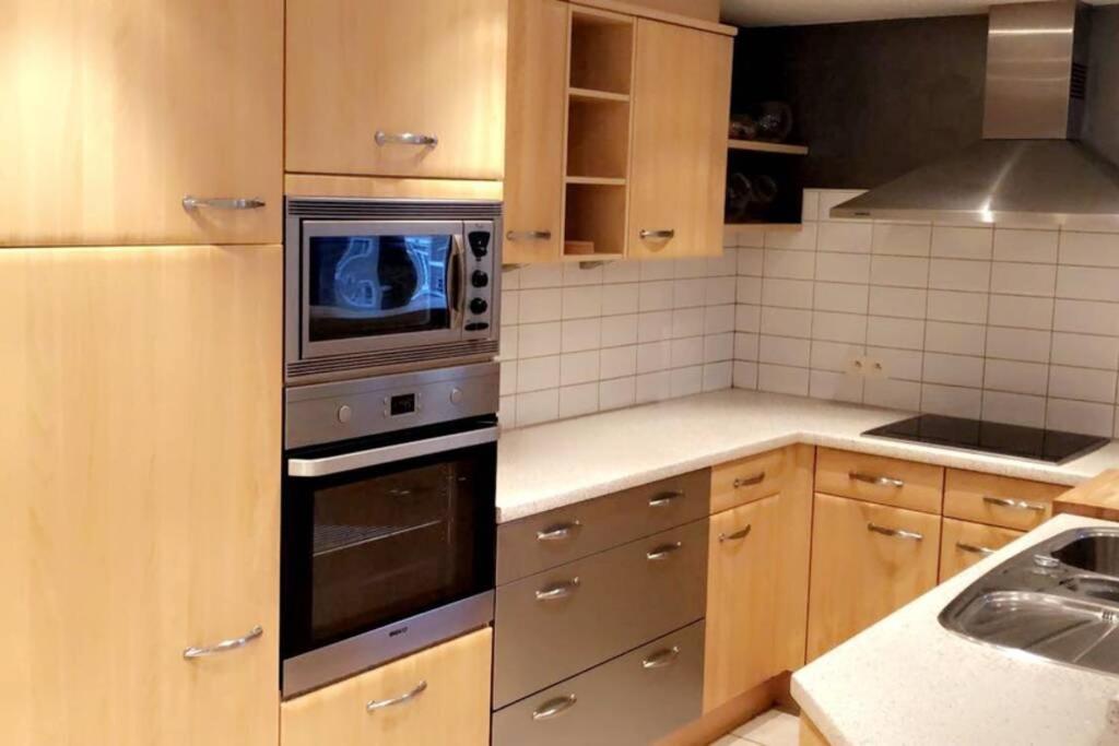 Kuchyň nebo kuchyňský kout v ubytování Le petit haut de Meuse