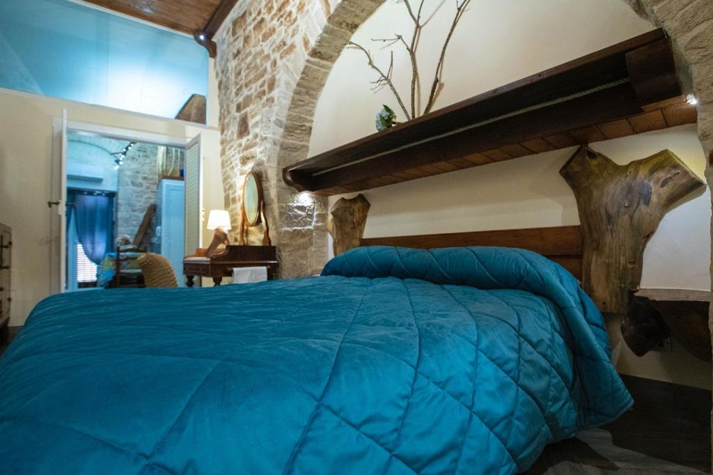 Krevet ili kreveti u jedinici u okviru objekta Le dimore di Talos Medea