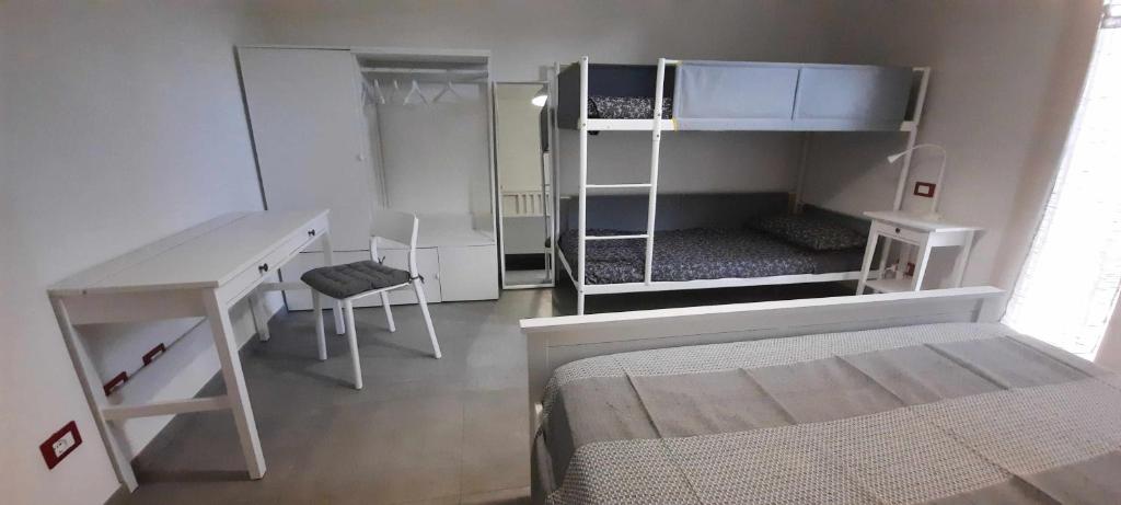 Postel nebo postele na pokoji v ubytování Al Cortile Tranquillo