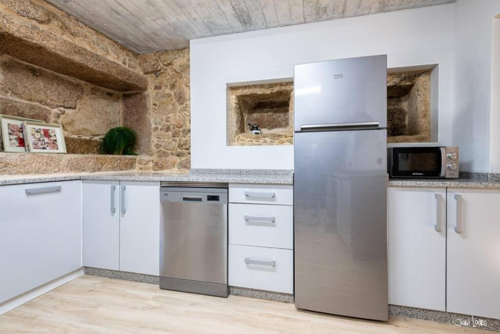 A kitchen or kitchenette at O AGOCHO DA MOA
