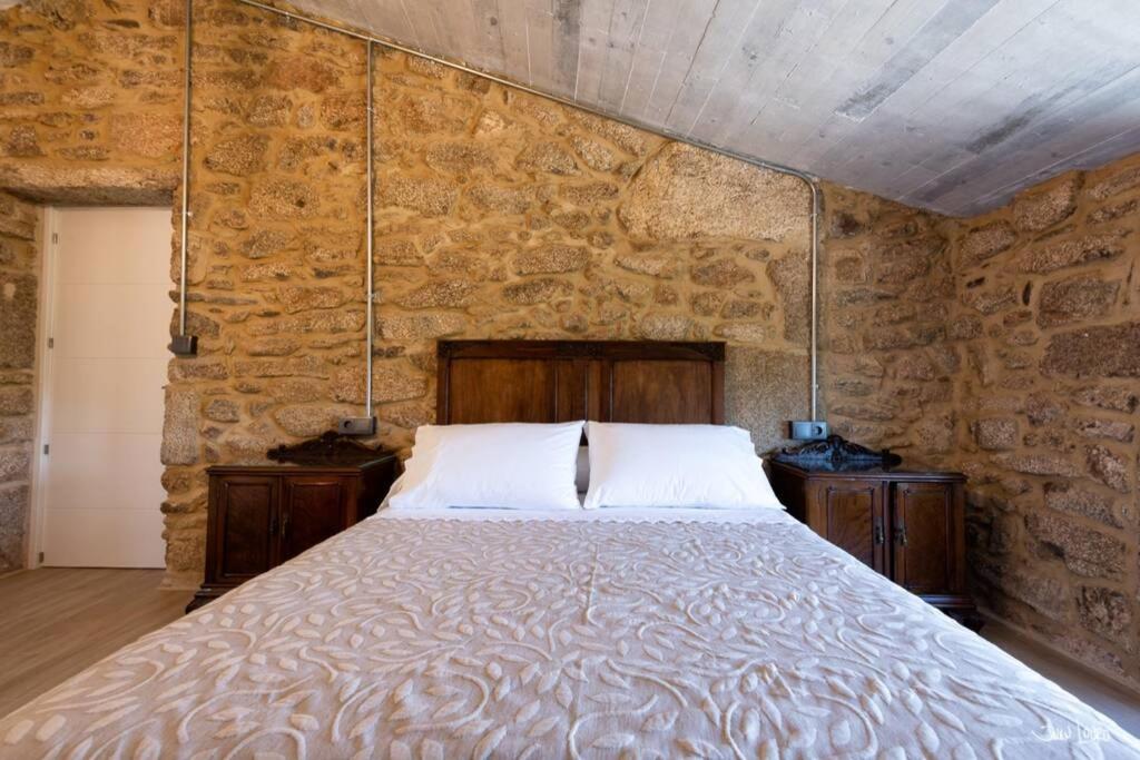 A bed or beds in a room at O AGOCHO DA MOA