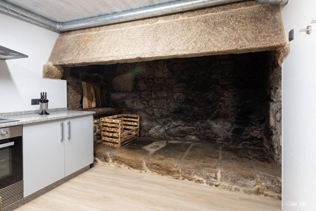 A kitchen or kitchenette at O AGOCHO DA MOA
