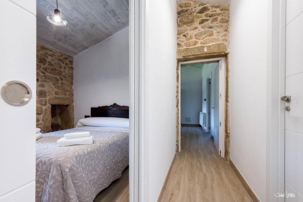 A bed or beds in a room at O AGOCHO DA MOA
