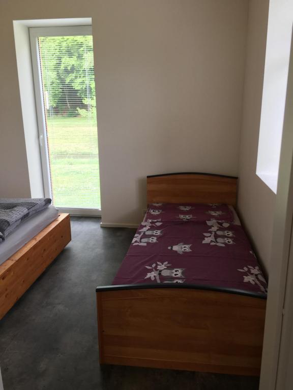 Postel nebo postele na pokoji v ubytování River wellness