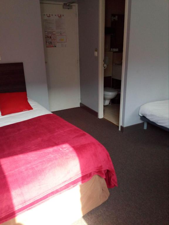 Postel nebo postele na pokoji v ubytování Auberge de Barnas