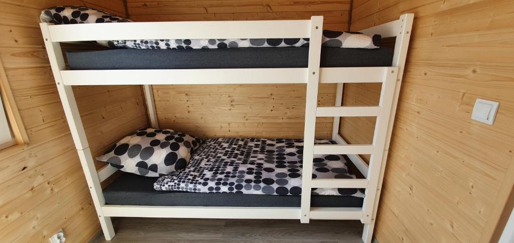 Postel nebo postele na pokoji v ubytování Domki Dafi