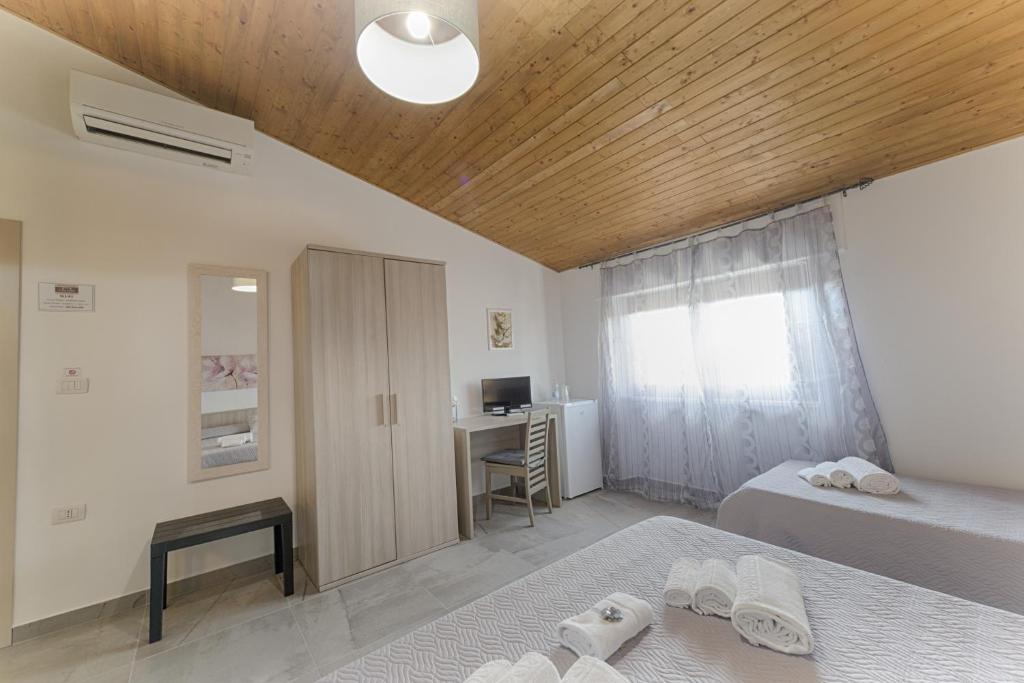 Postel nebo postele na pokoji v ubytování Casa Lucia