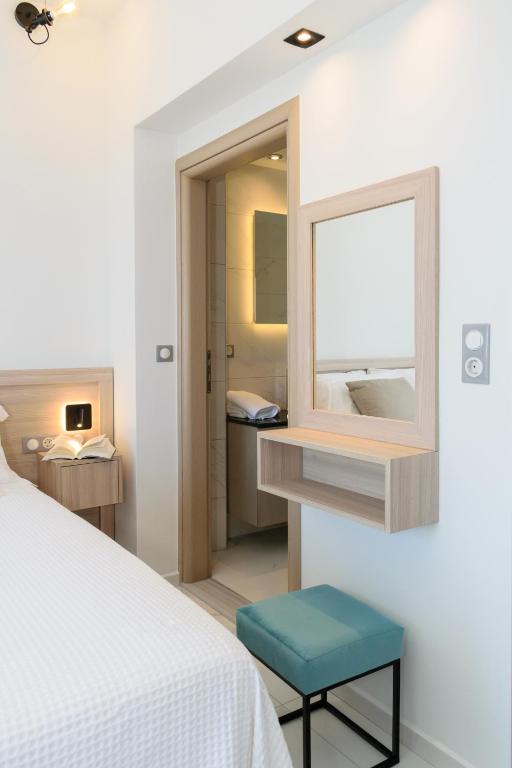 A bed or beds in a room at Katakis LuxuryVillas