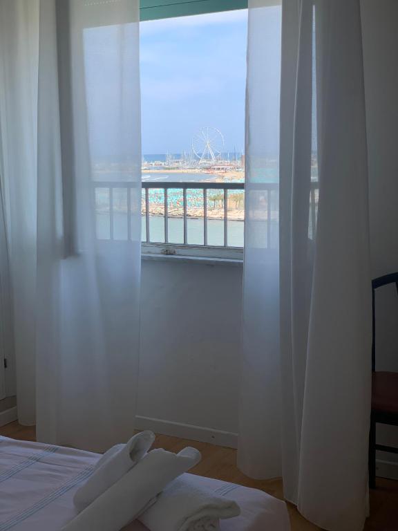 Postel nebo postele na pokoji v ubytování Hotel Laika