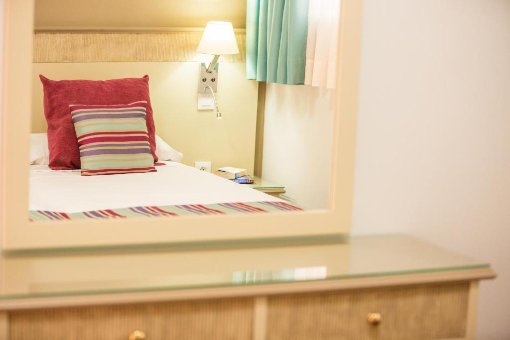 Postel nebo postele na pokoji v ubytování Amadores Beach Apartments