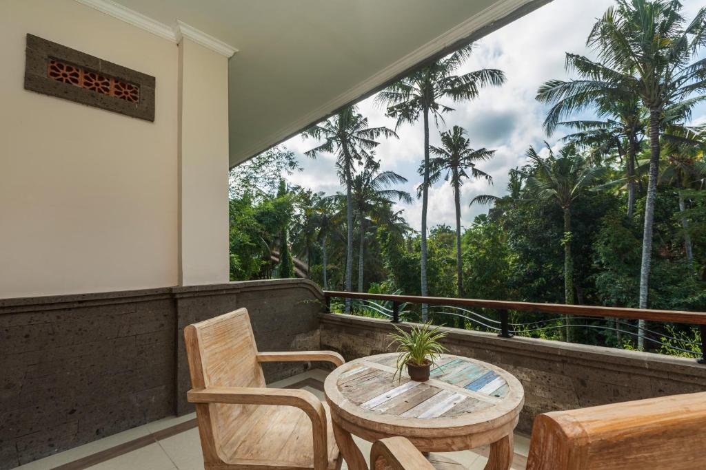 Balkón nebo terasa v ubytování The Artini Dijiwa Ubud