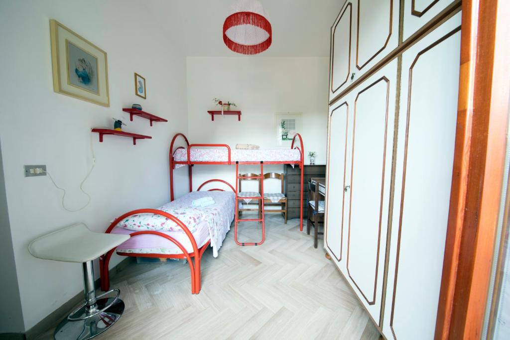 Łóżko lub łóżka w pokoju w obiekcie Casa vacanze Podere Bellavista