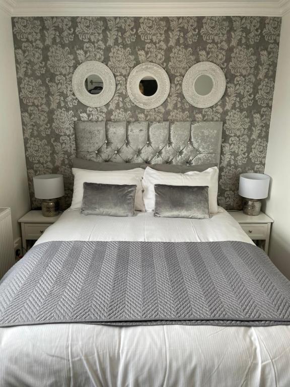 Кровать или кровати в номере Sandford Promenade