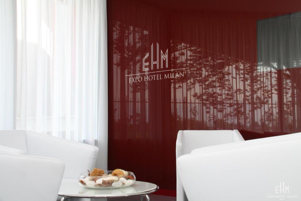 Postel nebo postele na pokoji v ubytování Expo Hotel Milan