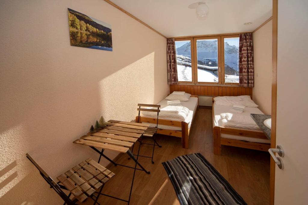 Postel nebo postele na pokoji v ubytování Tignousa logement de groupes et individuels