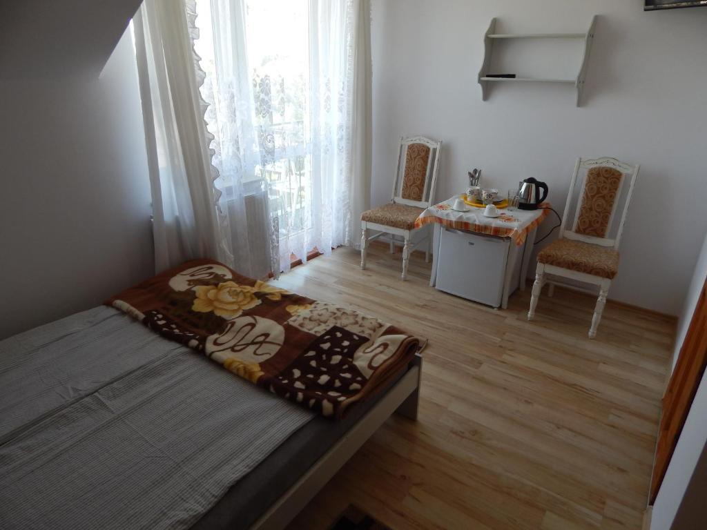Posteľ alebo postele v izbe v ubytovaní Villa Orkan