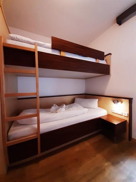 Postel nebo postele na pokoji v ubytování Hotel-Gasthof Andreas