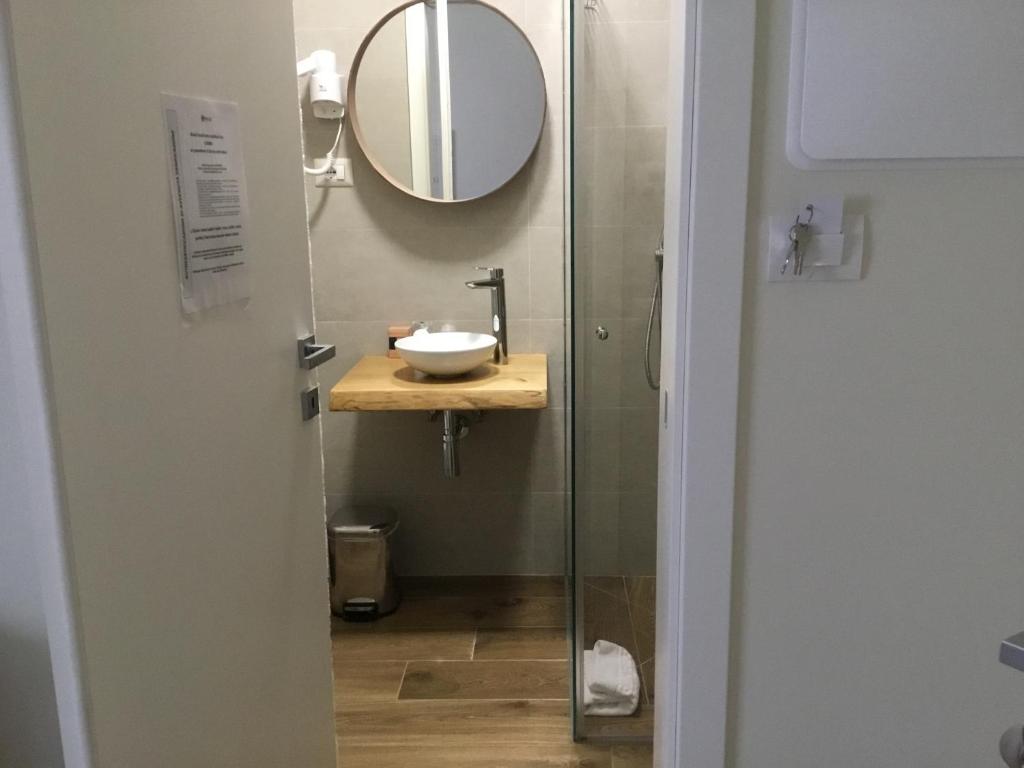 Koupelna v ubytování CAVALIERE suite & rooms