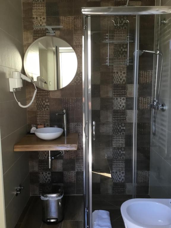 Koupelna v ubytování CAVALIERE suite & rooms