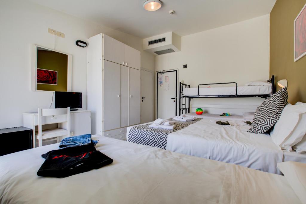 Postel nebo postele na pokoji v ubytování Hotel Christian Ideale Per Famiglie
