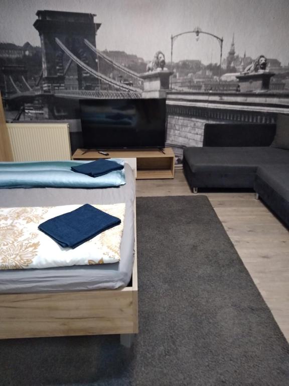 Posteľ alebo postele v izbe v ubytovaní two-floor comfort apartment