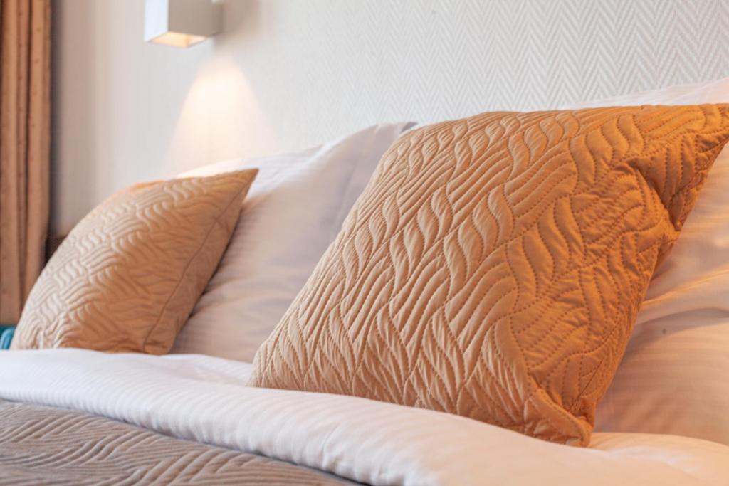 Postel nebo postele na pokoji v ubytování Hotel Monaco Zeebrugge Beach by Rikas Hotels