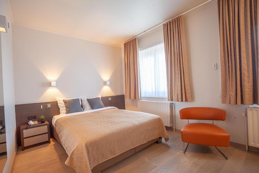 Ліжко або ліжка в номері Hotel Monaco Zeebrugge Beach