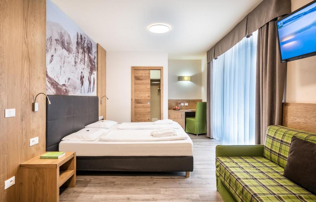 Postel nebo postele na pokoji v ubytování Parc Hotel Miramonti