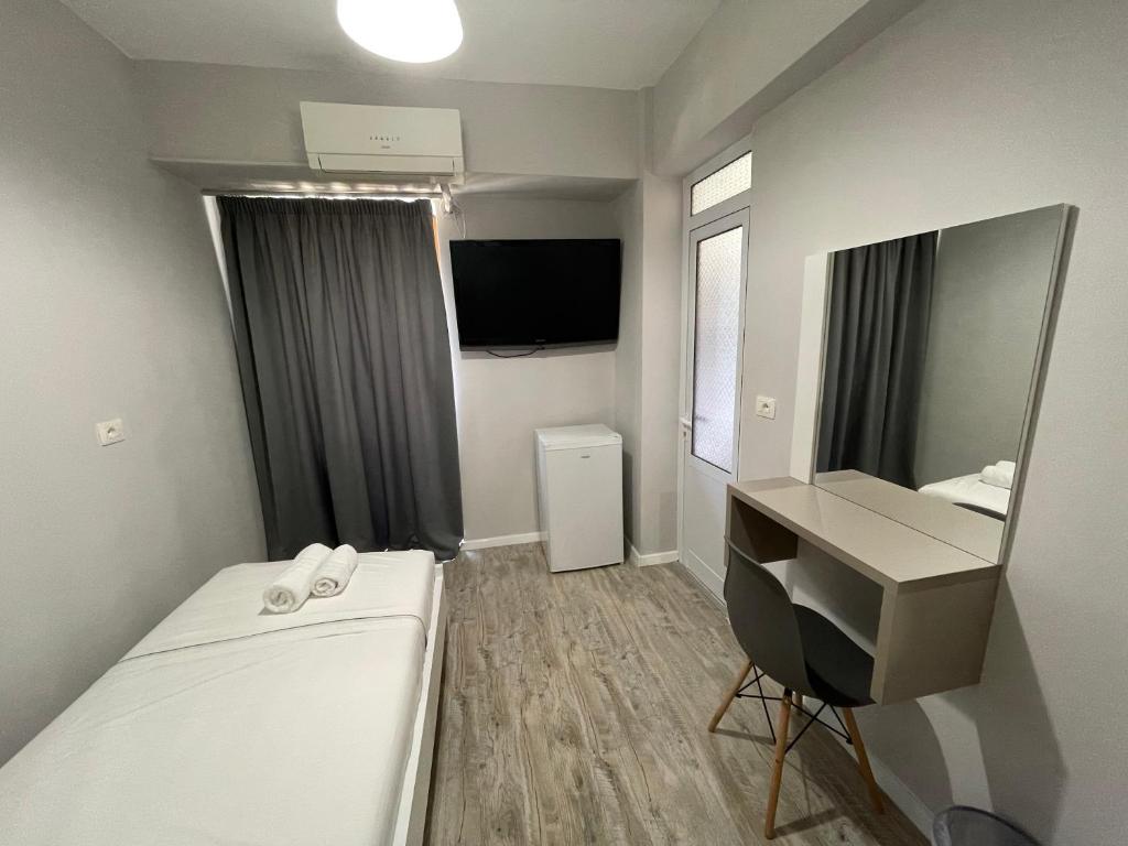 Postel nebo postele na pokoji v ubytování Hotel Cakalli