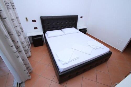 Postel nebo postele na pokoji v ubytování Hotel Lepenica